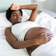 Illustration for article titled Two New Studies Find Black and Brown Mothers Less Likely to Have Their Postpartum Pain Evaluated and Addressed